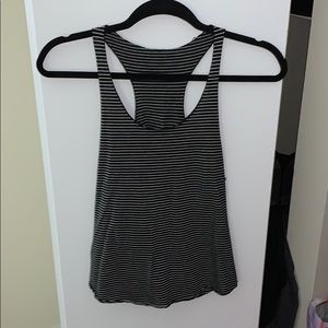 One grey and one black stripped tank tops.